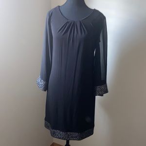 LM Studio Italy size SMALL black dress. Sheer sleeves.